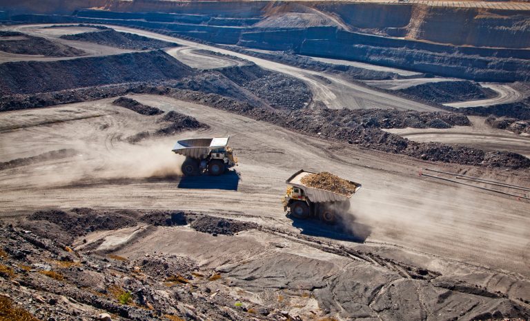 Two,Diesel-electric,Trucks,Used,In,Modern,Mines,And,Quarries,For