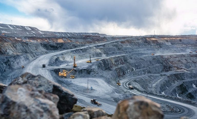 Work,Of,Heavy,Equipment,In,An,Open,Pit,For,Gold